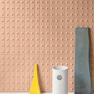Punto Up Glossy Brun, brauner Craquelé-Riegel mit erhabenem Punkt